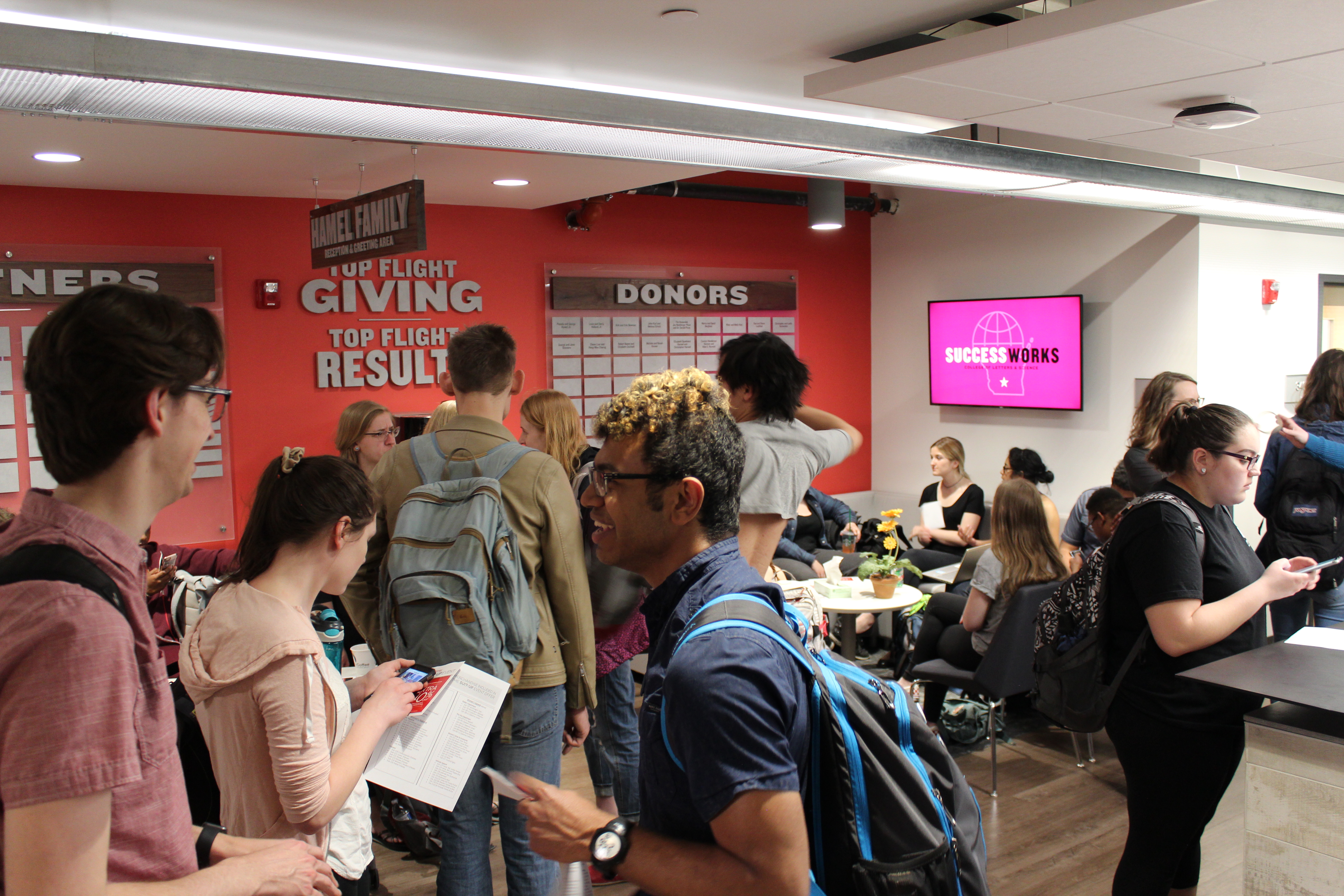 Students mingling in the SuccessWorks lobby